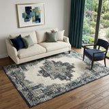 5' X 7' Cream Floral Power Loom Distressed Area Rug