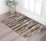 2' X 3' Brown Ivory and Tan Abstract Washable Non Skid Area Rug