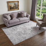 5' X 7' Blue And Pink Floral Power Loom Distressed Washable Area Rug