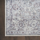 6' X 9' Blue And Pink Floral Power Loom Distressed Washable Area Rug