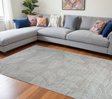 7' X 10' Beige and Ivory Floral Distressed Area Rug