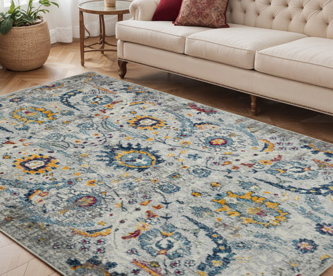 5' X 7' Orange and Ivory Floral Power Loom Area Rug