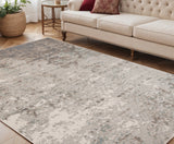 5' X 8' Gray And Ivory Abstract Area Rug
