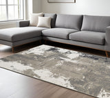 8' X 10' Ivory Black and Gray Abstract Power Loom Area Rug