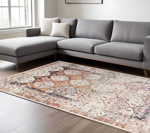 8' X 10' Beige Rust and Navy Floral Medallion Power Loom Area Rug