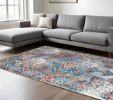 8' X 10' Ivory Blue And Orange Medallion Area Rug