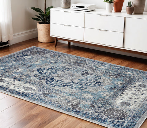 4' X 6' Ivory Blue And Gray Medallion Area Rug