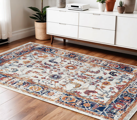 4' X 6' Ivory Navy and Orange Floral Power Loom Area Rug