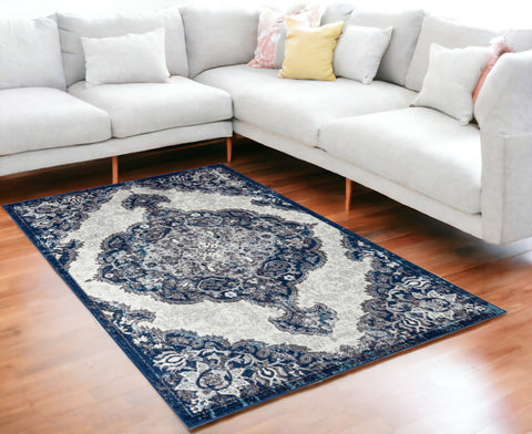 5' X 8' Ivory Gray And Blue Medallion Area Rug