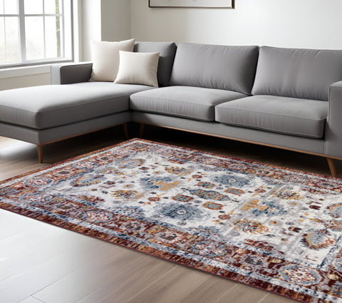 8' X 10' Ivory Brown and Orange Floral Power Loom Area Rug