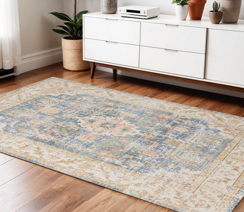 4' X 6' Blue Gold And Orange Floral Area Rug