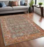 6' X 8' Teal And Orange Medallion Area Rug