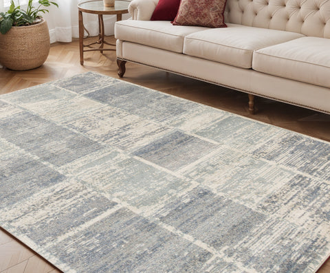 5' X 8' Gray Light Blue And Ivory Geometric Area Rug