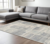 6' X 9' Gray Light Blue And Ivory Geometric Area Rug