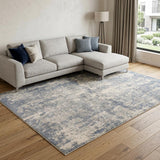 8' X 10' Light Gray Blue And Ivory Abstract Area Rug