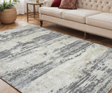 5' X 8' Ivory Beige And Gray Abstract Area Rug