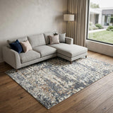 7' X 9' Blue and Ivory Abstract Power Loom Washable Area Rug