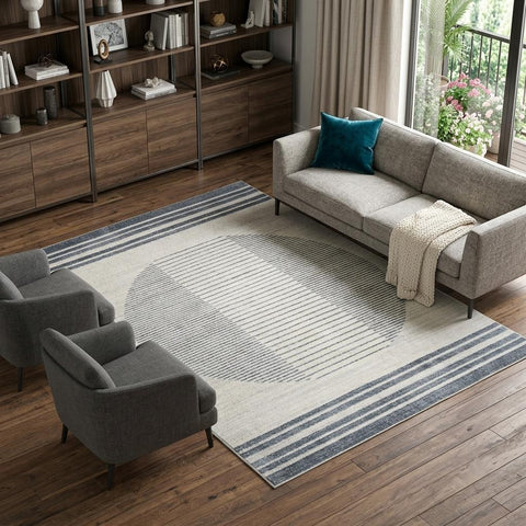 7' X 9' Blue And Ivory Geometric Washable Area Rug