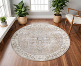 8' Beige Tan And Blue Floral Medallion Distressed Washable Round Rug