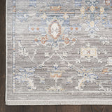 8' X 10' Ivory Blue and Gray Oriental Power Loom Distressed Area Rug With Fringe