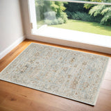 3' X 5' Blue and Ivory Oriental Power Loom Distressed Area Rug With Fringe
