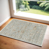 3' X 5' Green and Ivory Oriental Power Loom Distressed Area Rug With Fringe