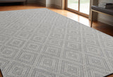5' X 8' Gray and Ivory Geometric Hand Woven Non Skid Area Rug