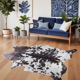5' X 7' Brown and White Cowhide Hand Knotted Area Rug