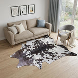 5' X 7' Brown and White Cowhide Hand Knotted Area Rug