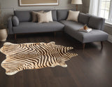 5' X 7' Beige and Brown Cowhide Hand Knotted Area Rug
