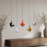 Set of Five Black Gold Orange Silver And White Resin Climbing Man Hanging Dimensional Sculpture