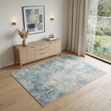 4' X 6' Blue and Ivory Abstract Power Loom Washable Area Rug