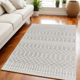 5' X 7' Blue and Ivory Abstract Power Loom Washable Area Rug
