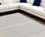 9' X 12' Blue and Ivory Abstract Power Loom Washable Area Rug