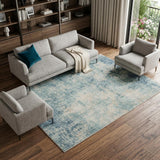 9' X 12' Blue and Ivory Abstract Power Loom Washable Area Rug