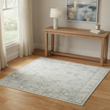 4' X 6' Light Blue Ivory And Yellow Floral Medallion Washable Area Rug