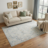 5' X 7' Blue and Ivory Floral Medallion Power Loom Distressed Washable Area Rug