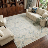 7' X 9' Blue and Ivory Floral Medallion Power Loom Distressed Washable Area Rug