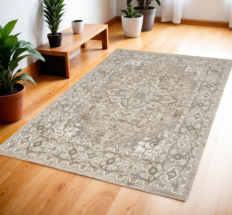 4' X 6' Beige and Ivory Medallion Power Loom Distressed Area Rug