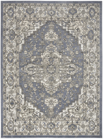 5' X 7' Blue and Ivory Medallion Power Loom Distressed Area Rug