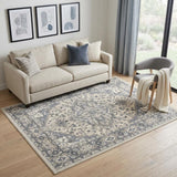 5' X 7' Blue and Ivory Medallion Power Loom Distressed Area Rug