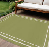 6' X 9' Green And Ivory Indoor Outdoor Area Rug