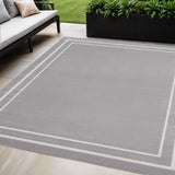 5' X 7' Gray And Ivory Indoor Outdoor Area Rug