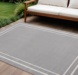 6' X 9' Gray And Ivory Indoor Outdoor Area Rug