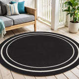 4' Black And Ivory Round Indoor Outdoor Area Rug