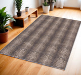 4' X 6' Yellow and Brown Leopard Print Power Loom Washable Non Skid Area Rug