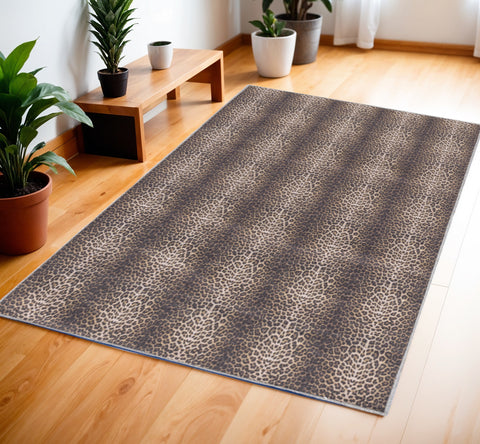 4' X 6' Yellow and Brown Leopard Print Power Loom Washable Non Skid Area Rug