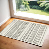 2' X 4' Gray and Ivory Striped Power Loom Distressed Area Rug