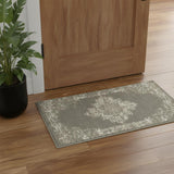2' X 4' Green And Ivory Medallion Distressed Area Rug