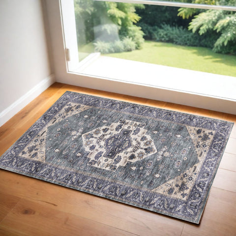 2' X 4' Blue and Ivory Medallion Power Loom Distressed Washable Non Skid Area Rug